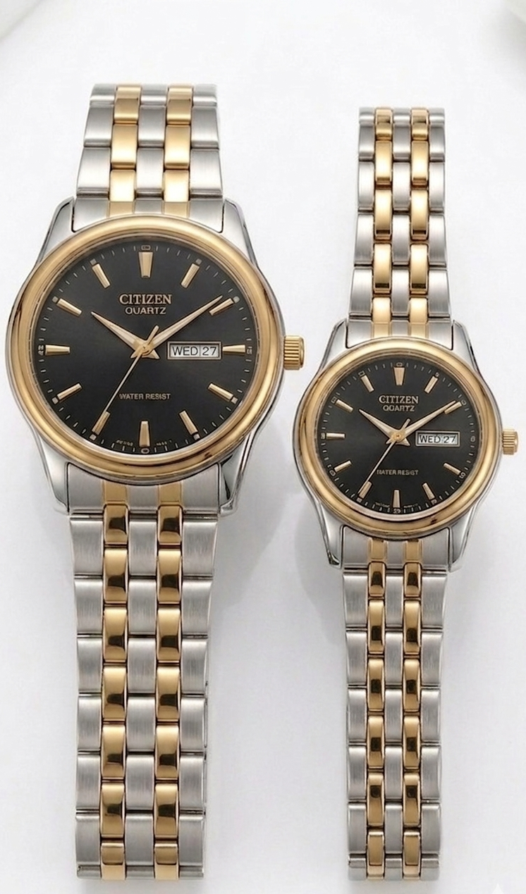 Two Citizen watches with silver and gold metal bands on a white background